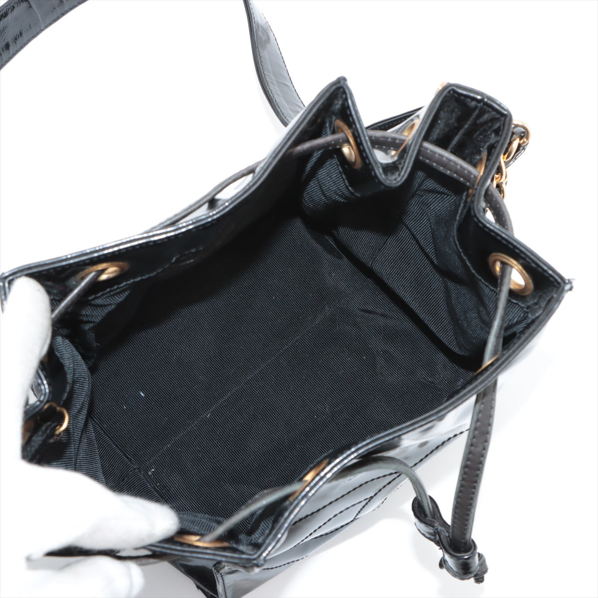 Sac seau vintage Chanel Coco en cuir vinyle noir