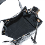 Sac seau vintage Chanel Coco en cuir vinyle noir