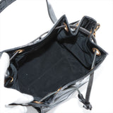 Sac seau vintage Chanel Coco en cuir vinyle noir