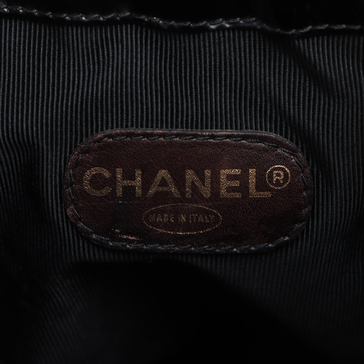 Sac seau vintage Chanel Coco en cuir vinyle noir