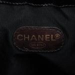Sac seau vintage Chanel Coco en cuir vinyle noir