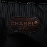 Sac seau vintage Chanel Coco en cuir vinyle noir