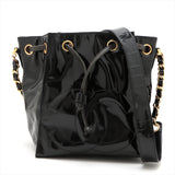 Sac seau vintage Chanel Coco en cuir vinyle noir