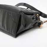 Sac seau vintage Chanel Coco en cuir vinyle noir