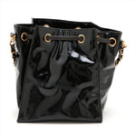 Sac seau vintage Chanel Coco en cuir vinyle noir