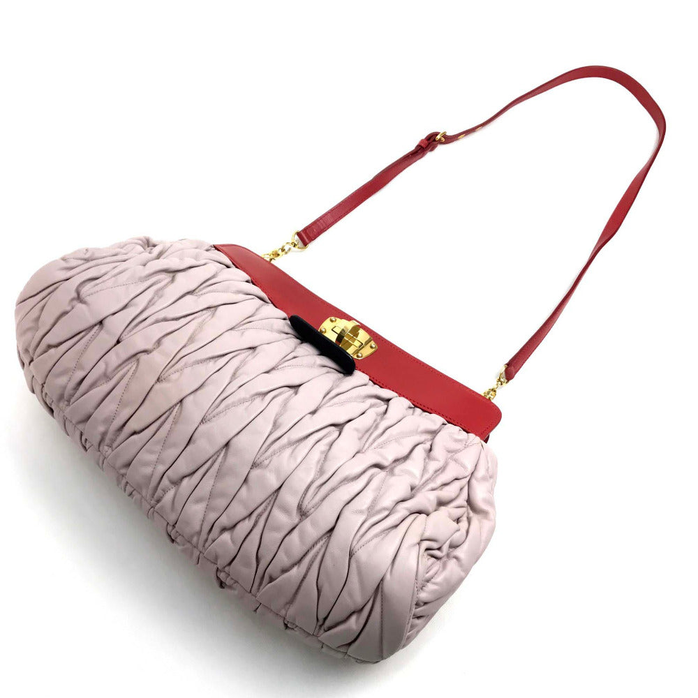 Sac à main vintage MIU MIU matelassé cuir noir rose rouge